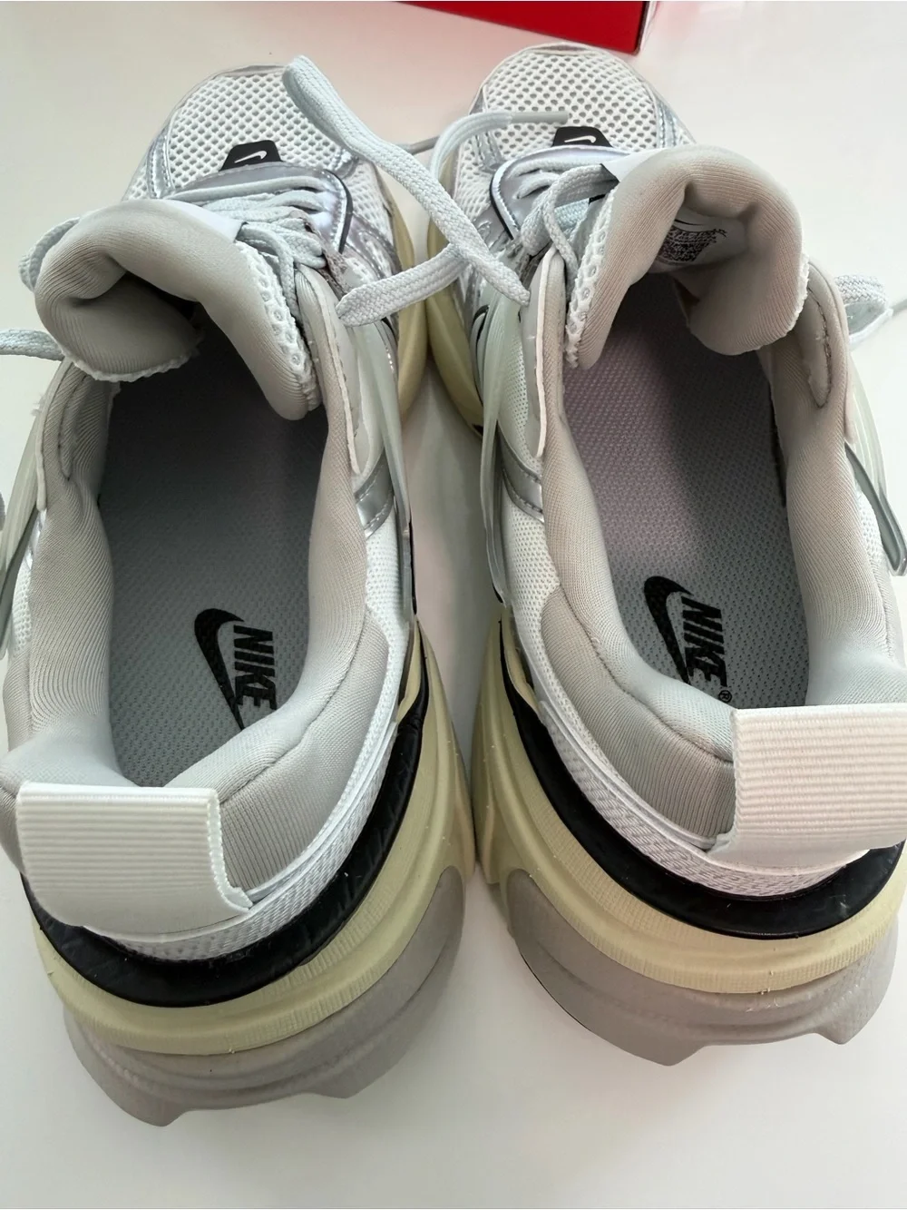 Women Nike V2K sneakers.